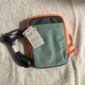 lululemon Easy Access Crossbody bag in green/orange. Brand new, with tags